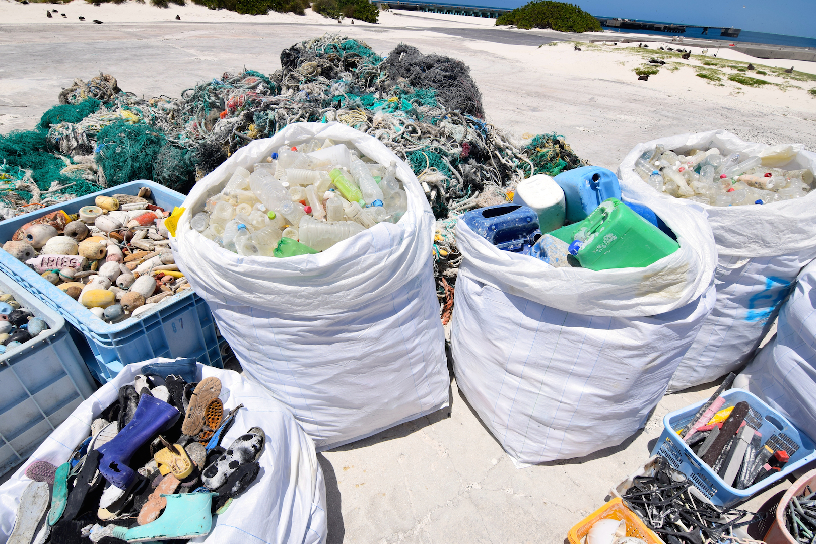 Midway, Atoll, Island, Northwestern, Hawaiian, beach, clean up, marine, debris, plastic, nets, floats, fishing, removal, bottles, shoes, hangers,